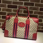 Gucci Soft GG Supreme duffle bag with Web red